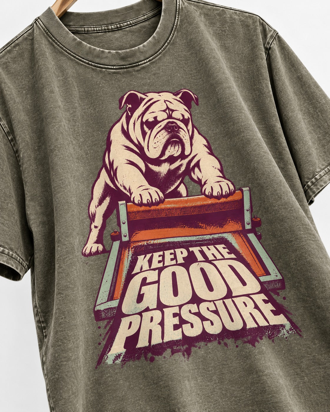 English Bulldog Keep the Good Pressure Printing Press Graphic Washed Tee in Army Green, close-up of the graphic