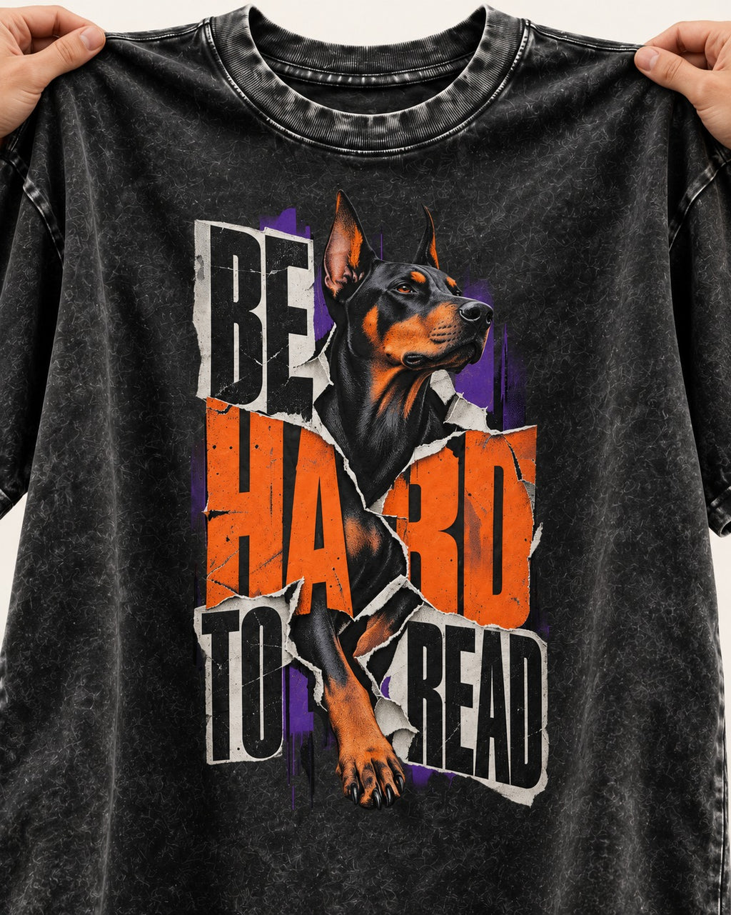 Doberman Be Hard to Read Torn Poster Graphic Washed Tee in Black, close-up of the graphic