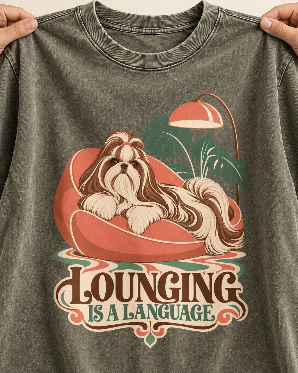 Shih Tzu Lounging Is a Language Retro Lounge Graphic Washed Tee in Army Green, close-up of the graphic