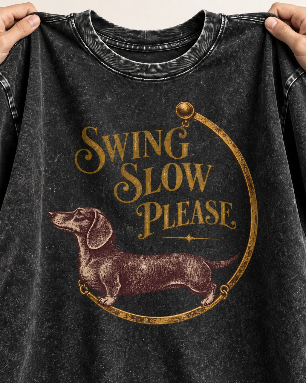 Dachshund Swing Slow Please Necklace Frame Graphic Washed Tee in Black, close-up of the graphic