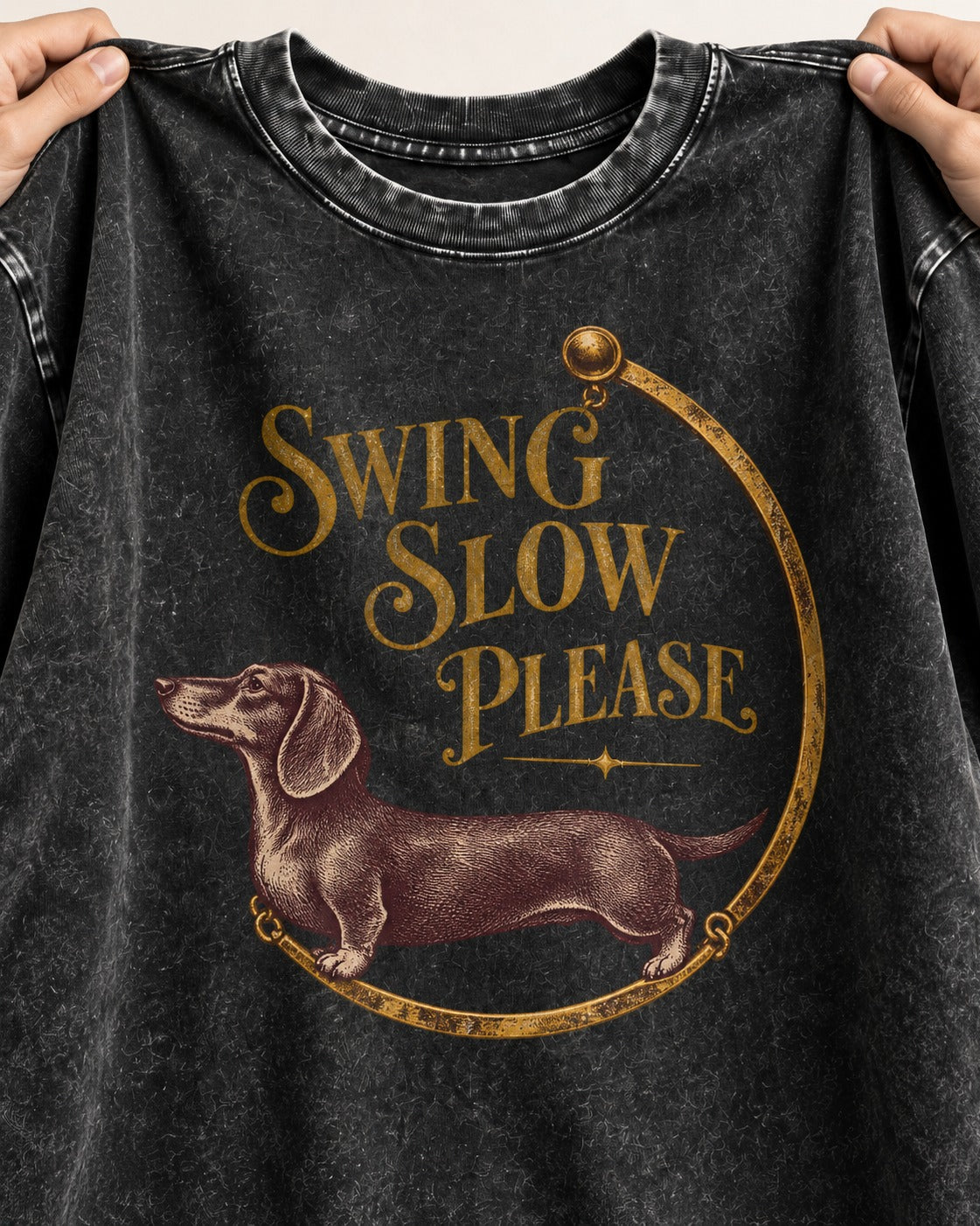 Dachshund Swing Slow Please Necklace Frame Graphic Washed Tee in Black, close-up of the graphic