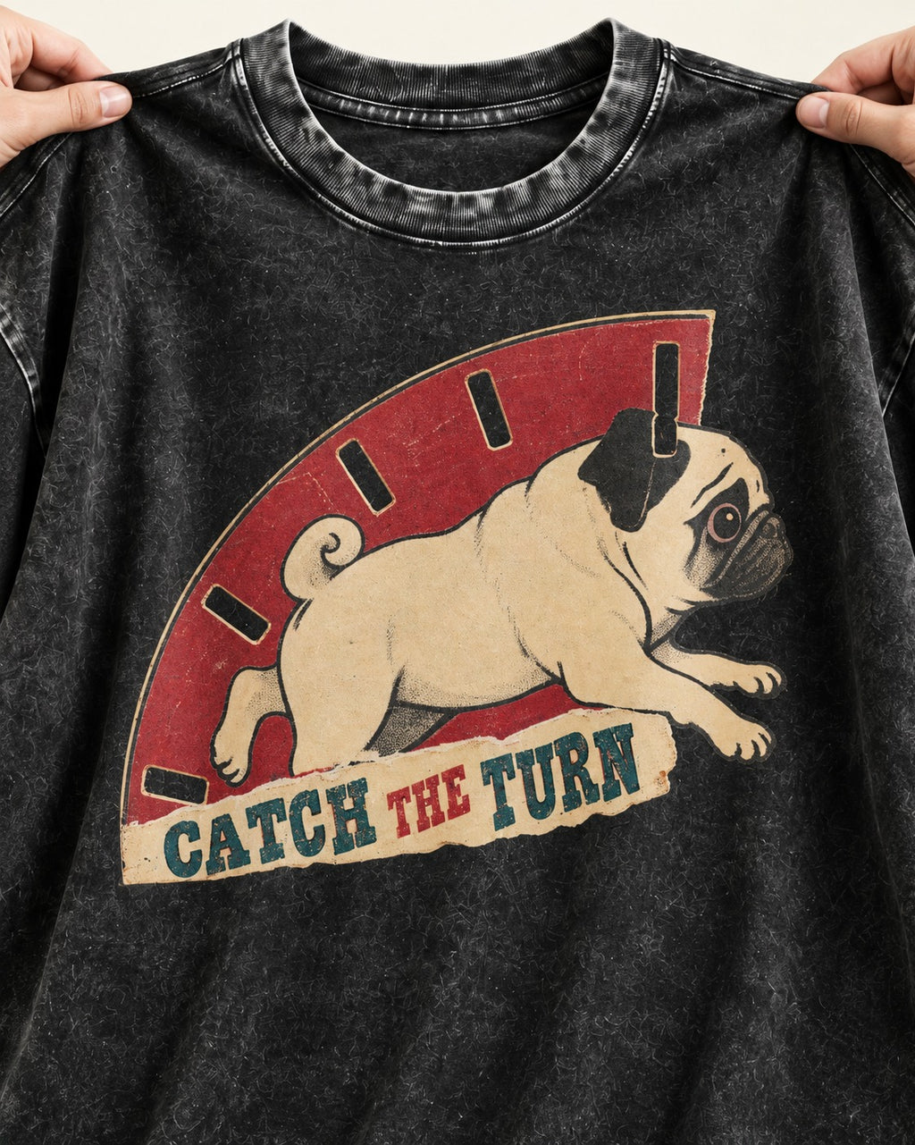 Pug Catch the Turn Track Graphic Washed Tee in Black, close-up of the graphic
