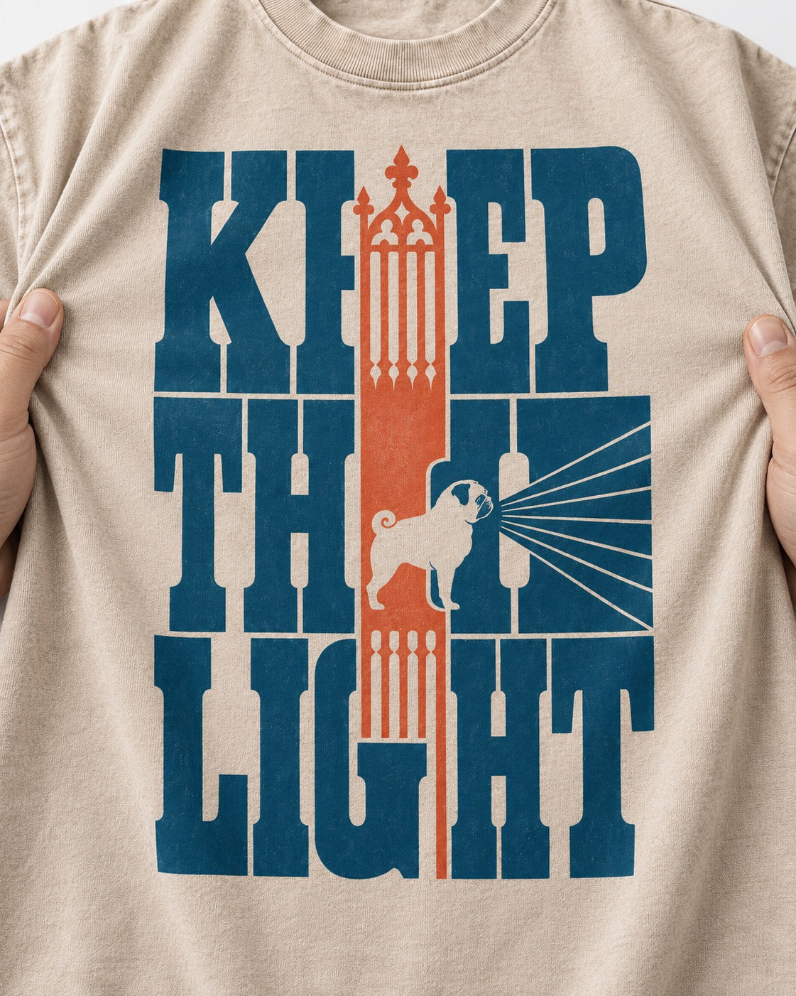Keep the Pug Fight Washed Tee in Apricot, close-up of the graphic