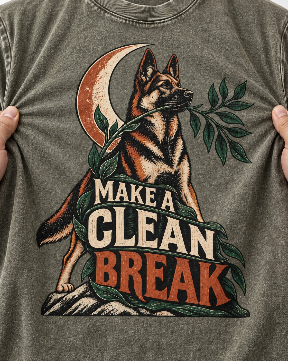 Make A Clean Break Crescent Botanical German Shepherd Dog Graphic Washed Tee in Army Green, close-up of the graphic