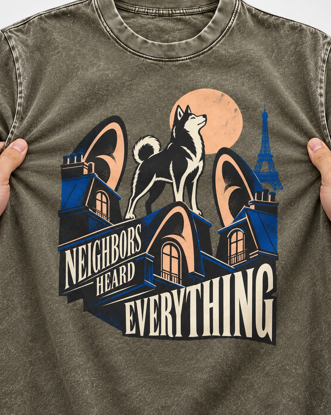Husky Neighbors Heard Everything Paris Rooftop Graphic Washed Tee in Army Green, close-up of the graphic