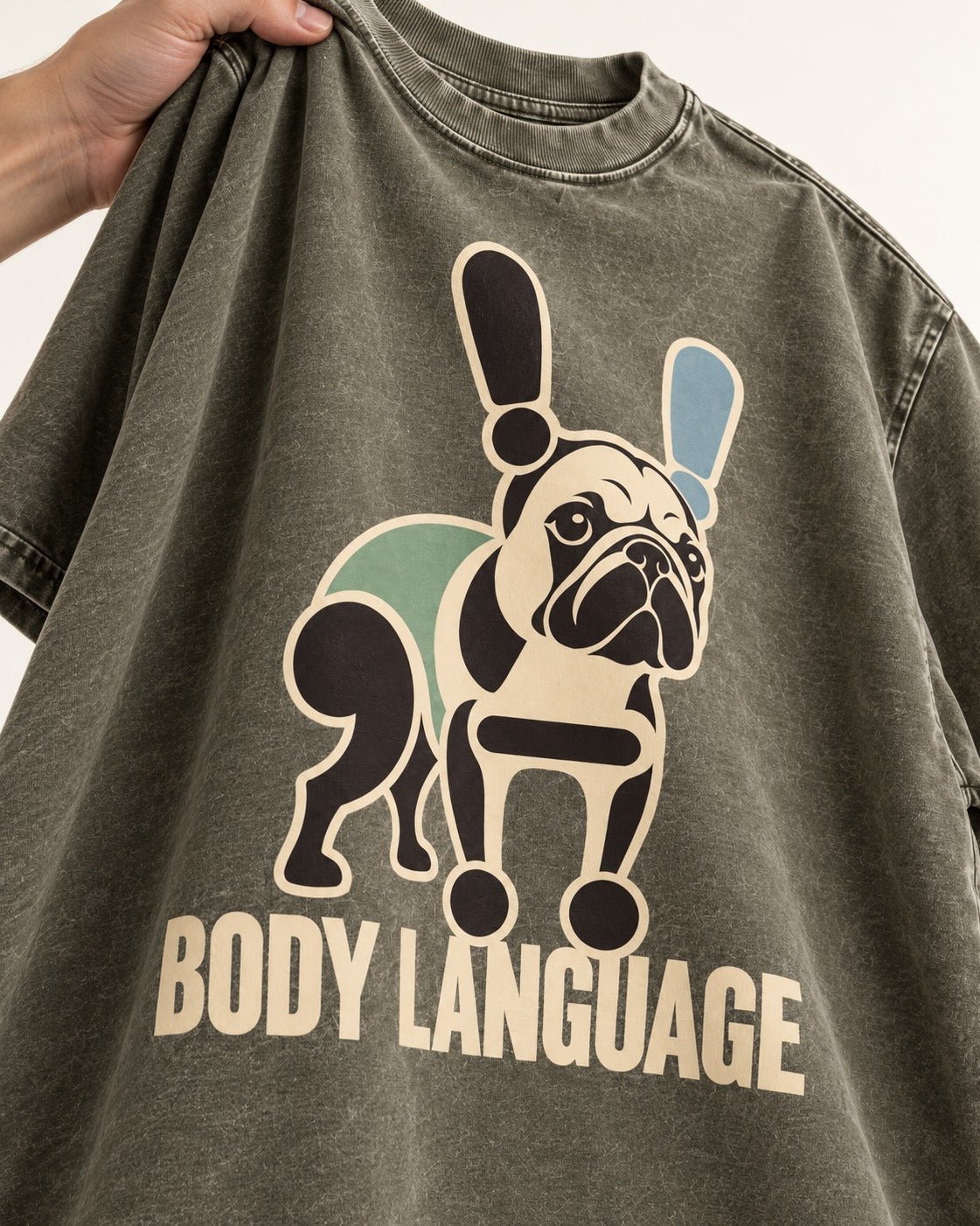 Frenchie Body Language Punctuation Graphic Washed Tee in Army Green, close-up of the graphic