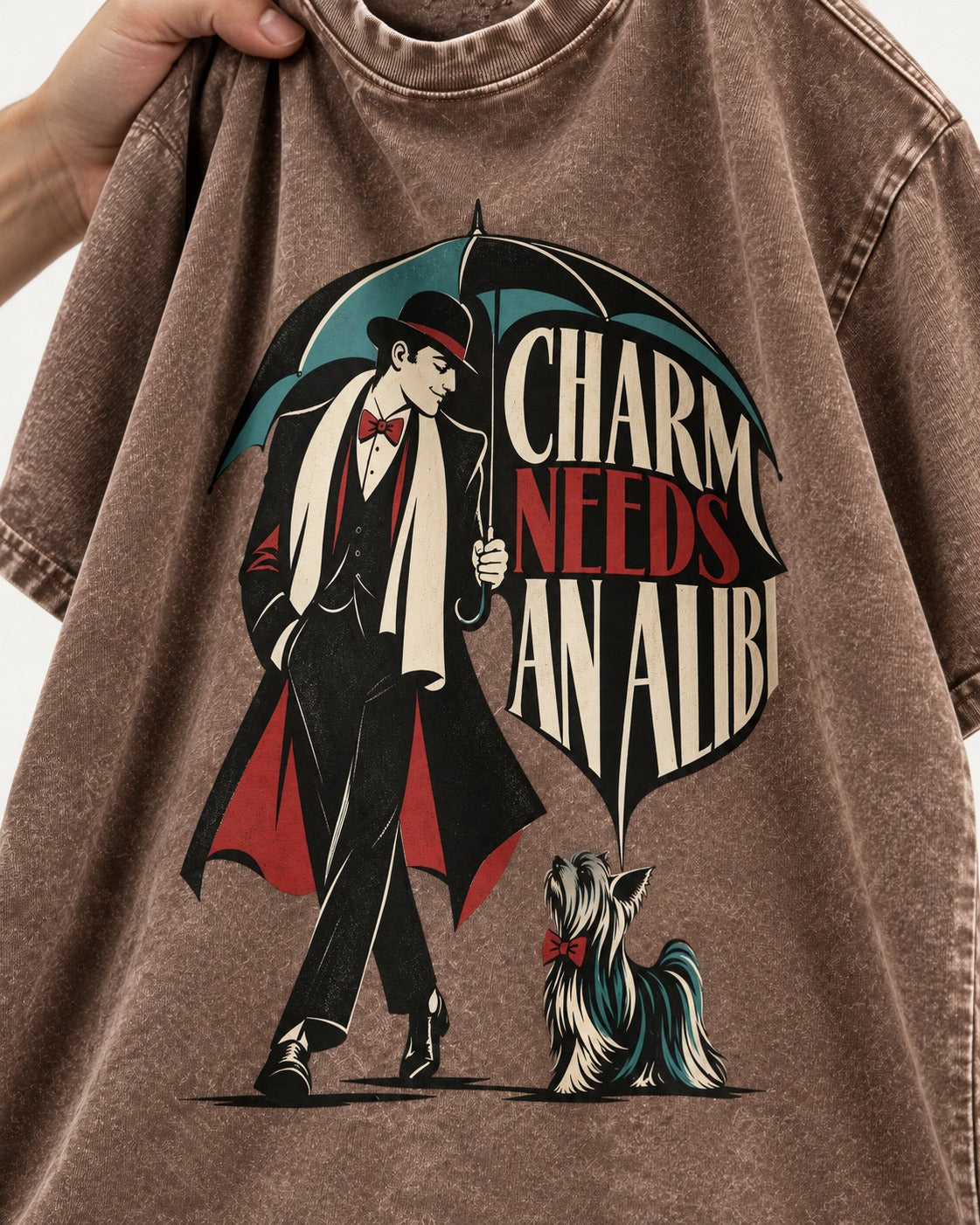 Charm Needs an Alibi Yorkshire Terrier Washed Tee in Coffee, close-up of the graphic