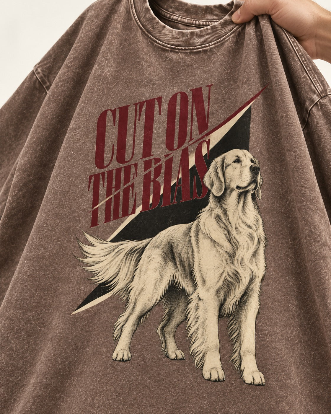 Cut on the Bias Golden Retriever Washed Tee in Coffee, close-up of the graphic