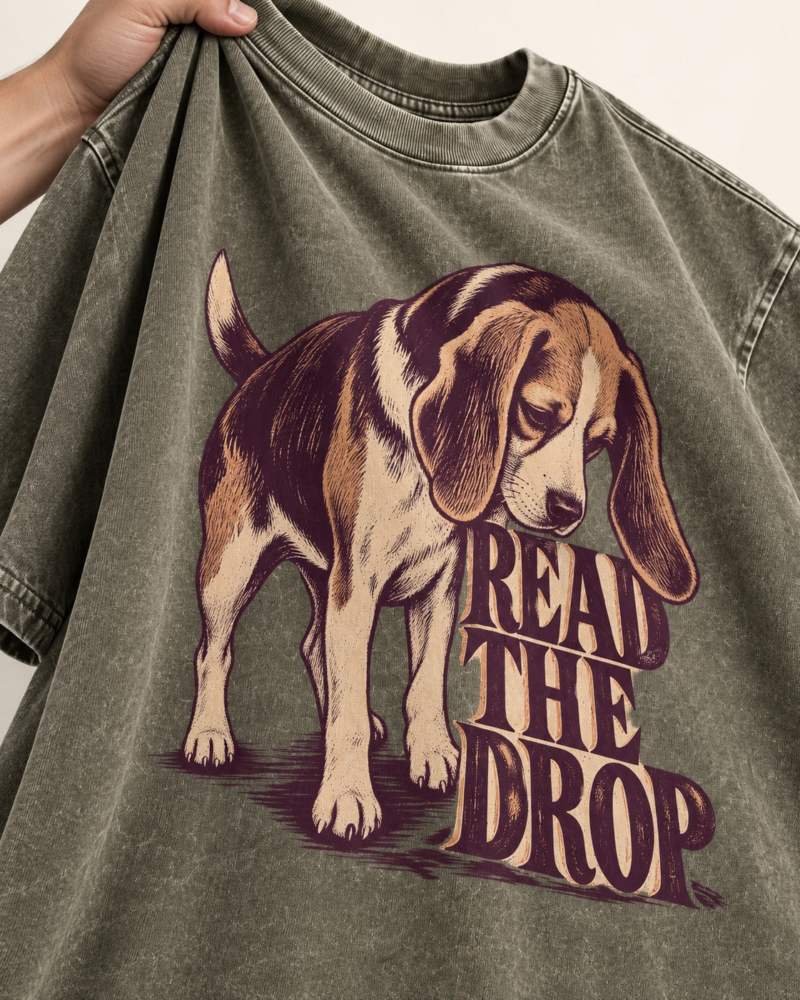 Beagle Read The Drop Washed Tee in Army Green, close-up of the graphic
