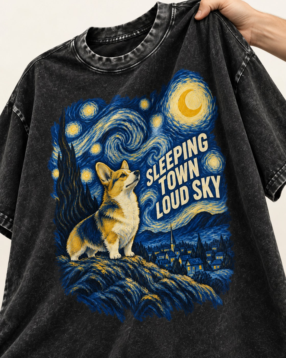 Corgi Sleeping Town Loud Sky Starry Night Washed Tee in Black, close-up of the graphic