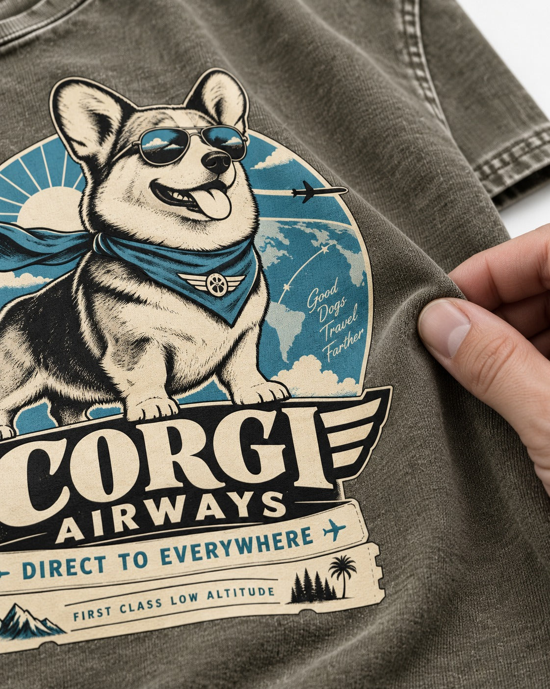 Corgi Airways Direct to Everywhere Badge Washed Tee in Army Green, close-up of the graphic
