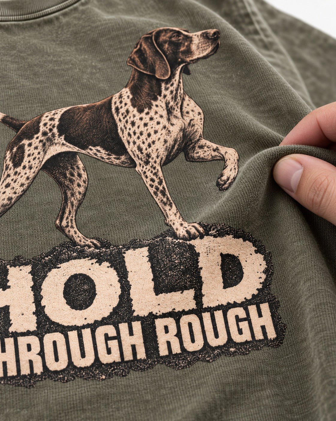 German Shorthaired Pointer Hold Through Rough Vintage Graphic Washed Tee in Army Green, close-up of the graphic