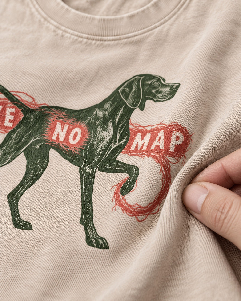 Leave No Map German Shorthaired Pointer Washed Tee in Apricot, close-up of the graphic