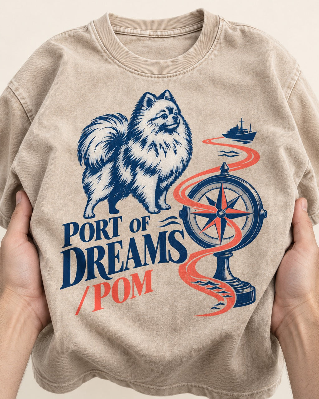 Pomeranian Port of Dreams Washed Tee in Apricot, close-up of the graphic