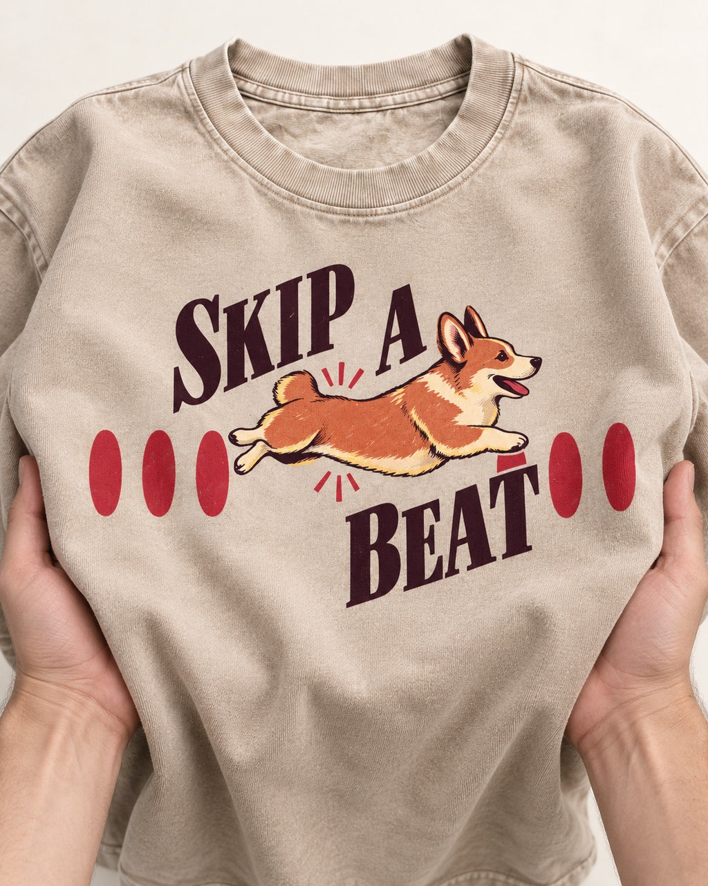 Skip a Beat Corgi Washed Tee in Apricot, close-up of the graphic