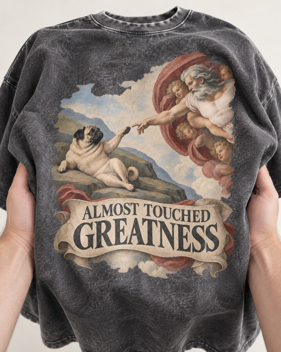 Pug Almost Touched Greatness Creation Parody Graphic Washed Tee in Gray, close-up of the graphic