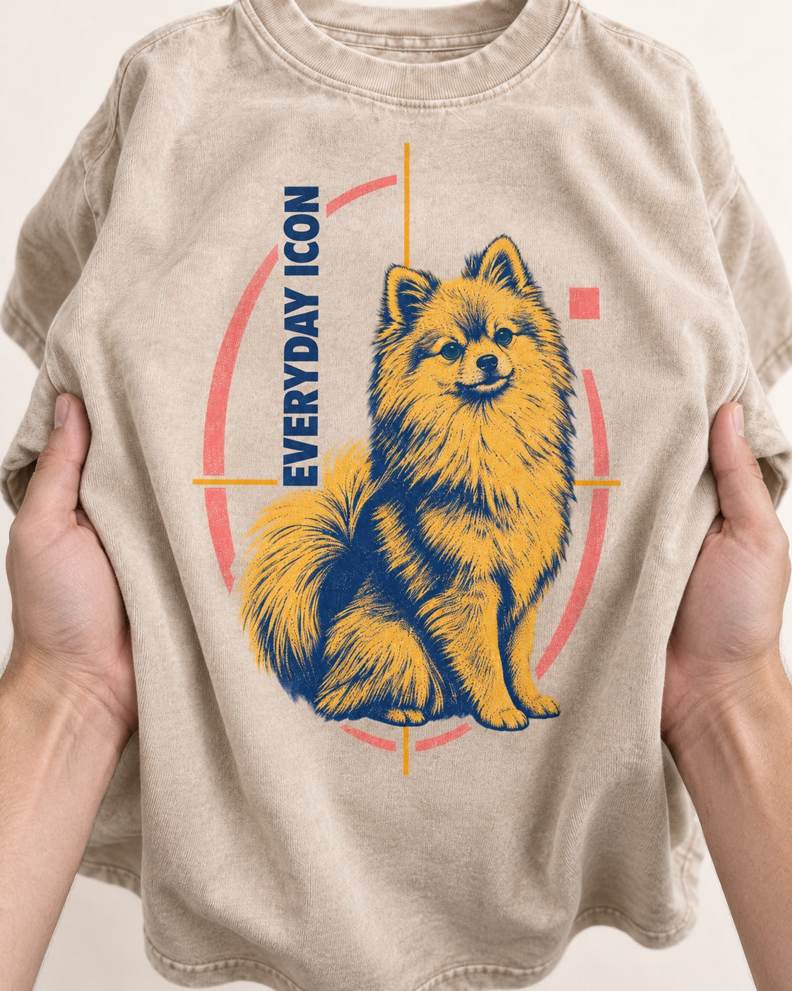 Pomeranian Everyday Icon Washed Tee in Apricot, close-up of the graphic