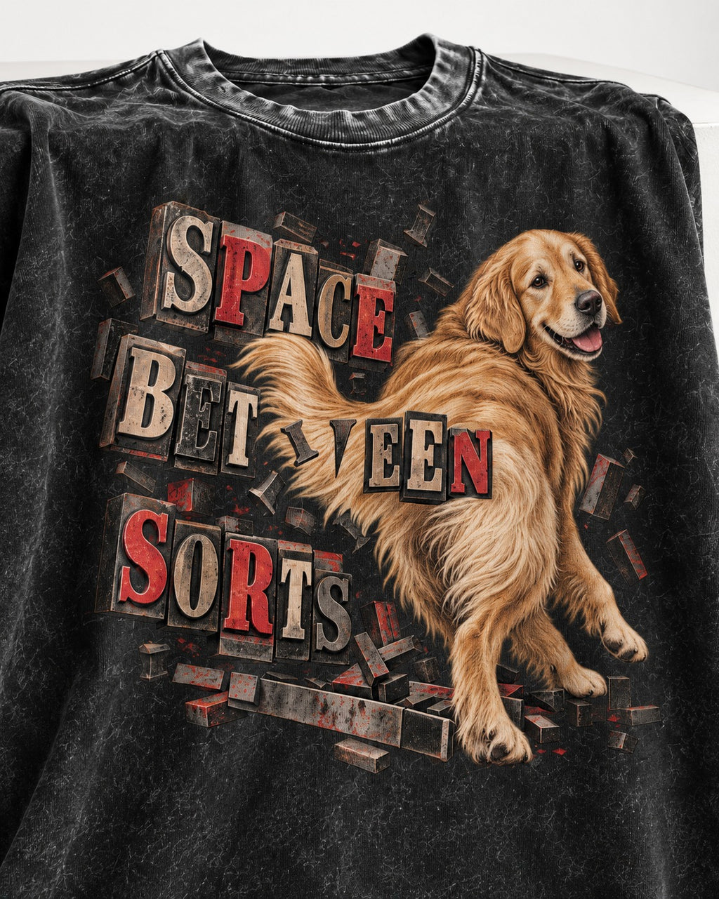 Golden Retriever Space Between Sorts Letterpress Graphic Washed Tee in Black, close-up of the graphic