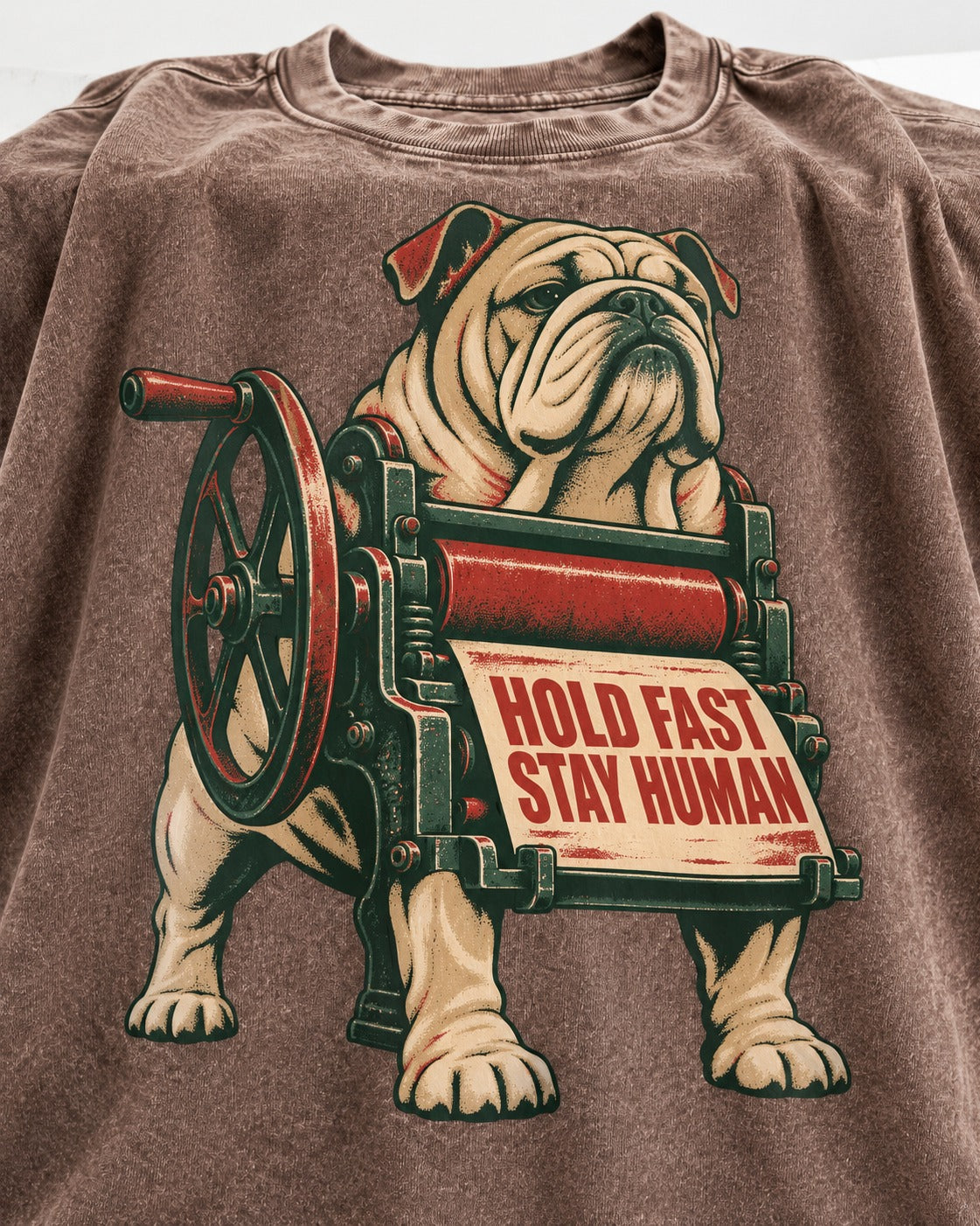 Hold Fast Stay Human English Bulldog Washed Tee in Coffee, close-up of the graphic