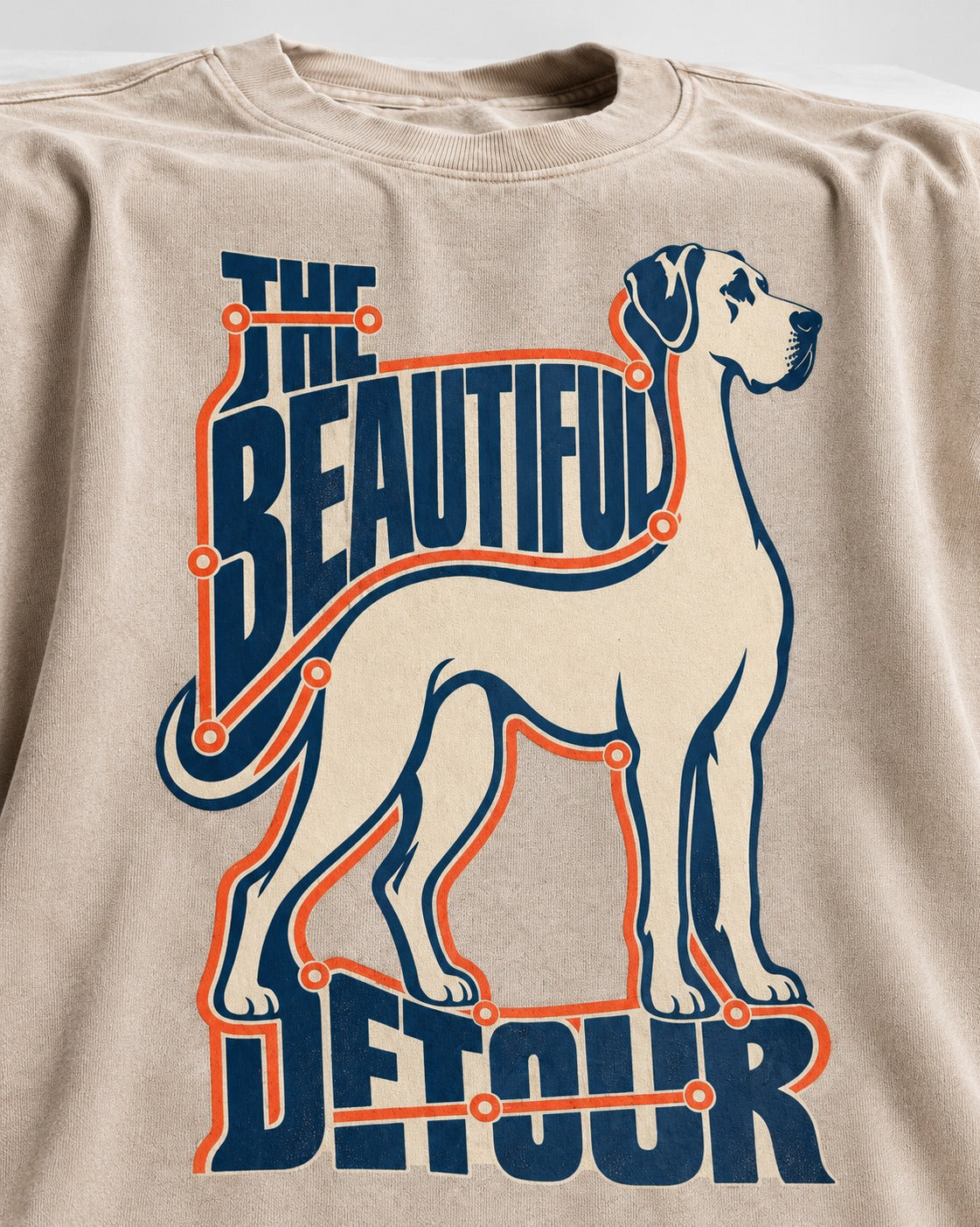 Great Dane's Beautiful Detour Washed Tee in Apricot, close-up of the graphic