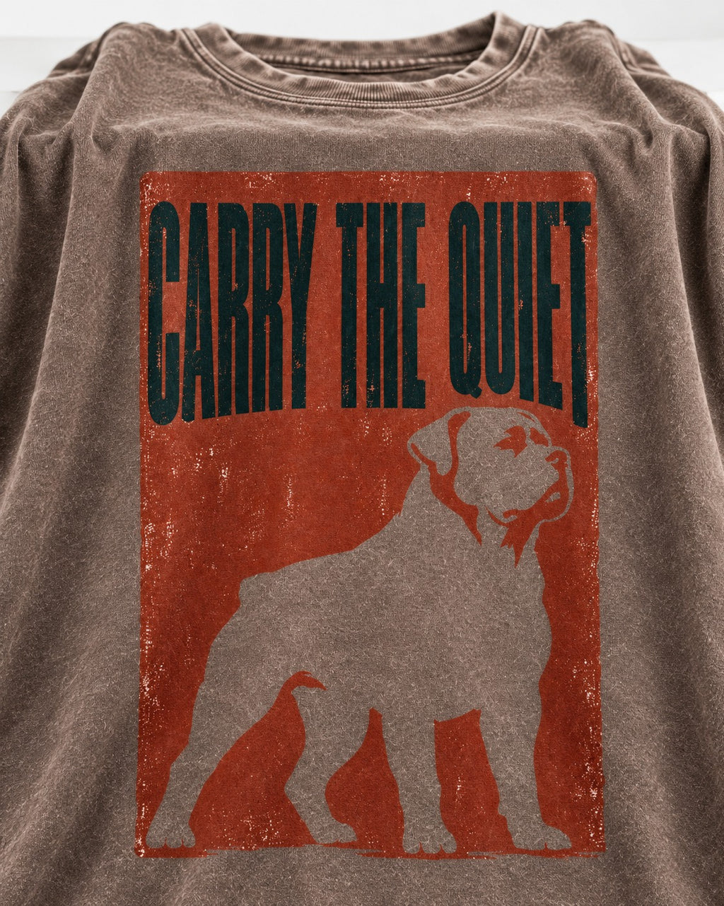 Rottweiler Carry the Quiet Washed Tee in Coffee, close-up of the graphic