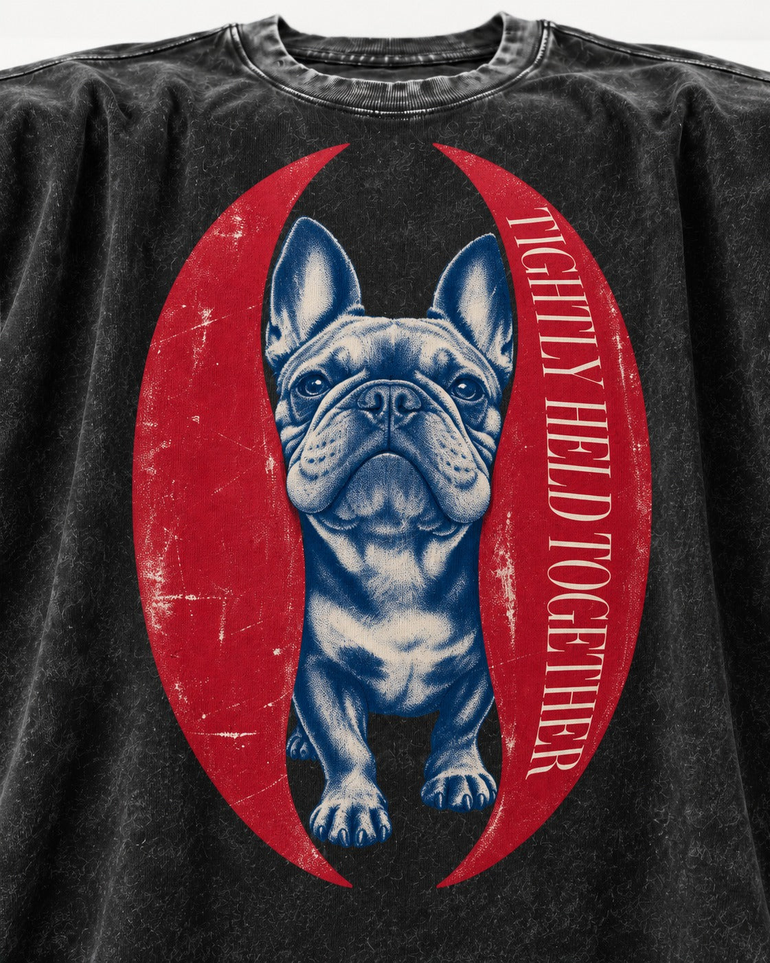 Frenchie Tightly Held Together Red Oval Graphic Washed Tee in Black, close-up of the graphic