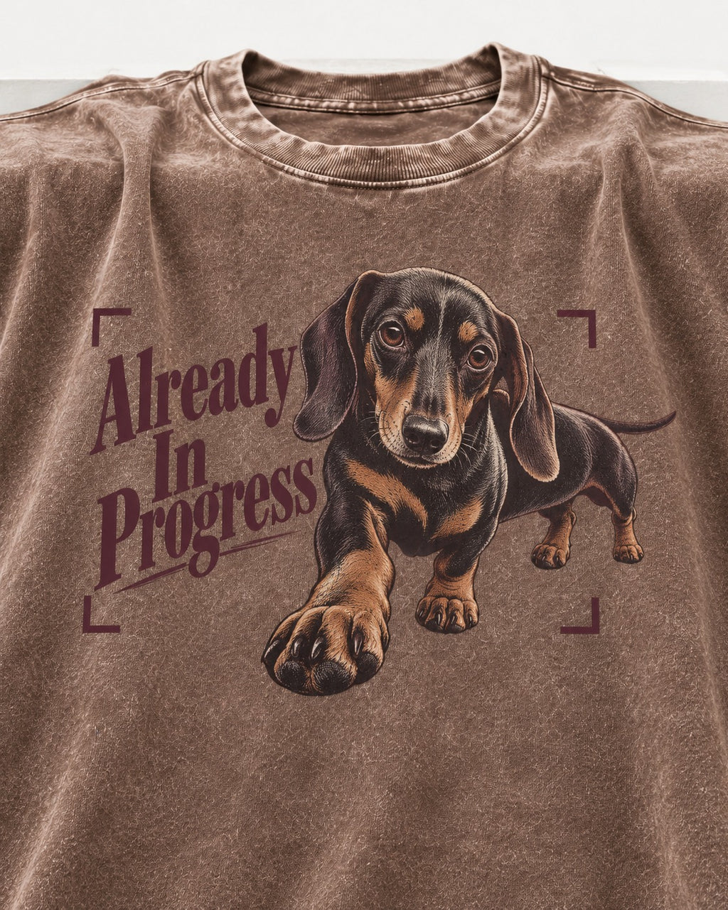 Dachshund Already in Progress Washed Tee in Coffee, close-up of the graphic
