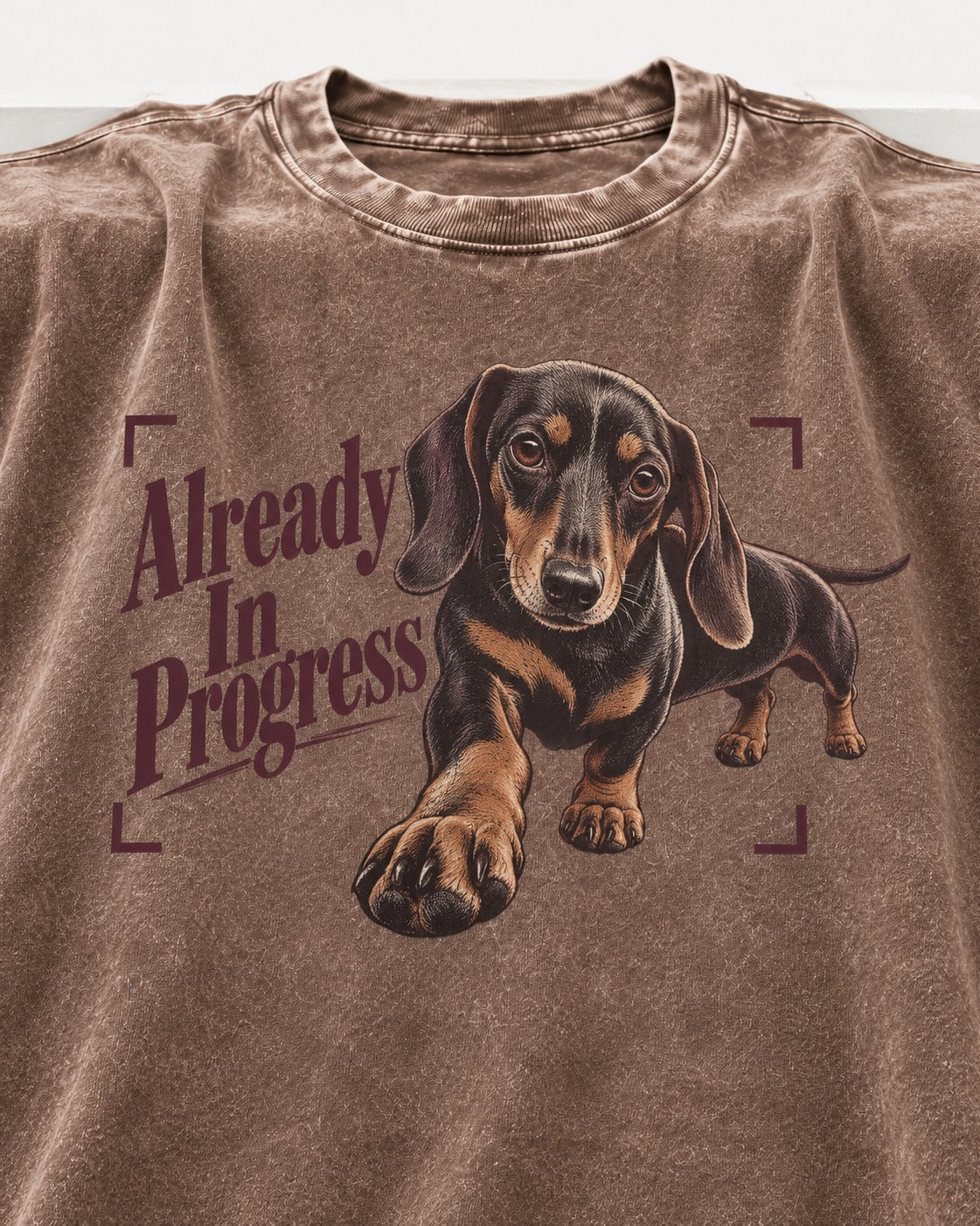 Dachshund Already in Progress Washed Tee in Coffee, close-up of the graphic
