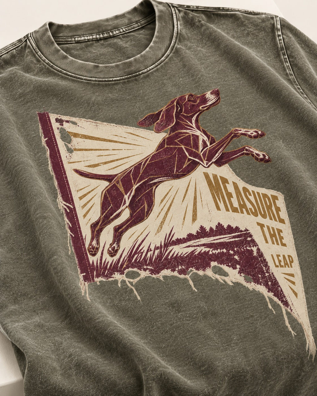 German Shorthaired Pointer Measure the Leap Torn Banner Graphic Washed Tee in Army Green, close-up of the graphic
