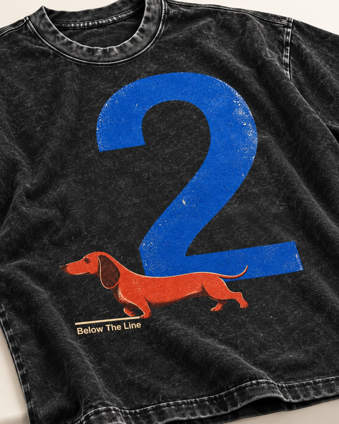 Dachshund Below The Line Number Two Graphic Washed Tee in Black, close-up of the graphic