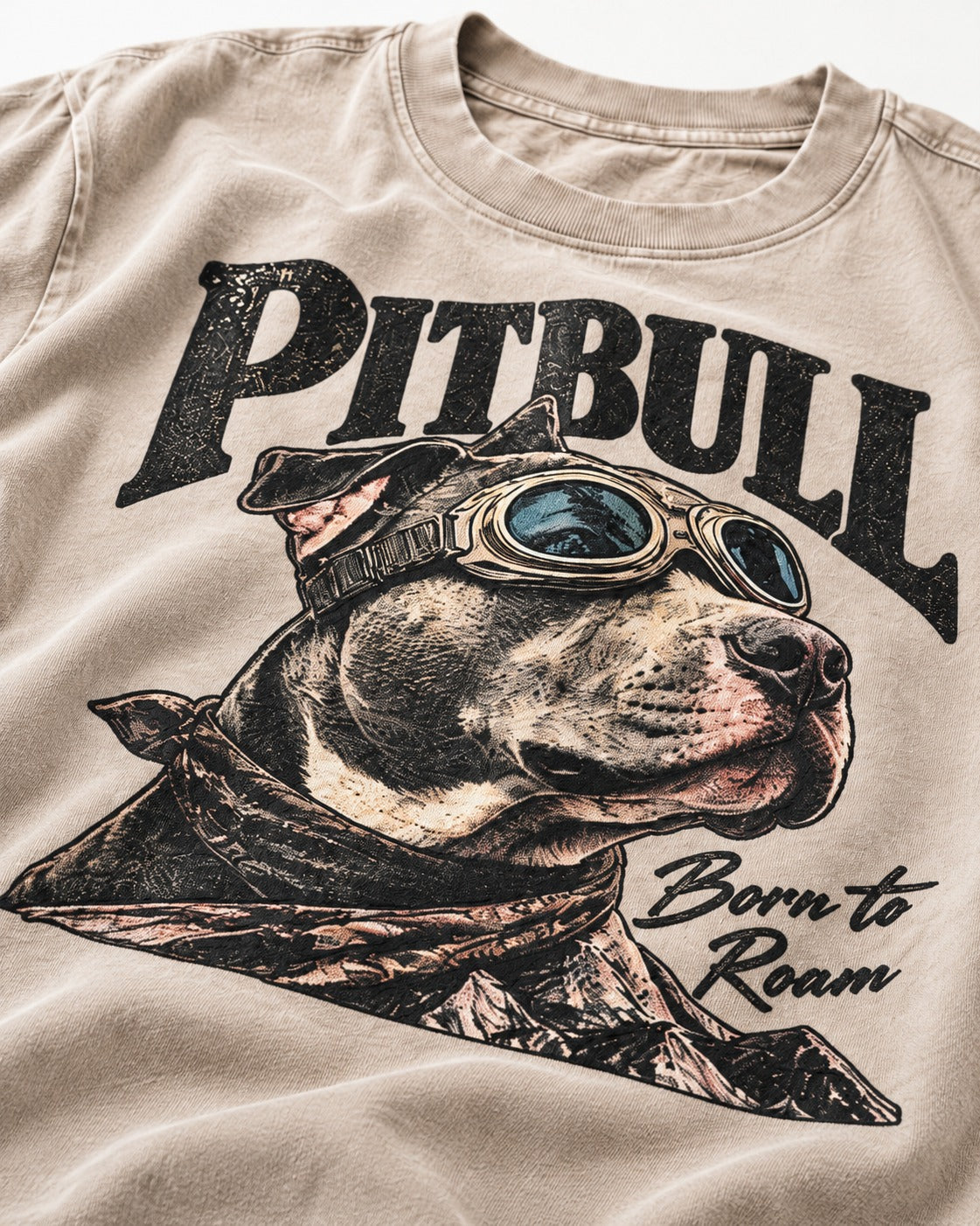 Pitbull Born to Roam Washed Tee in Apricot, close-up of the graphic