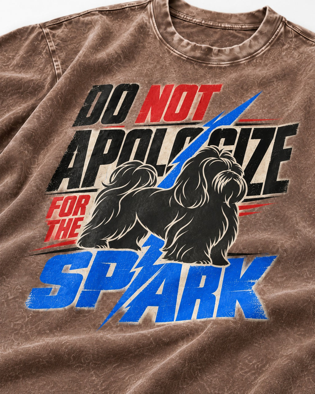 Never Apologize for Shih Tzu Spark Washed Tee in Coffee, close-up of the graphic