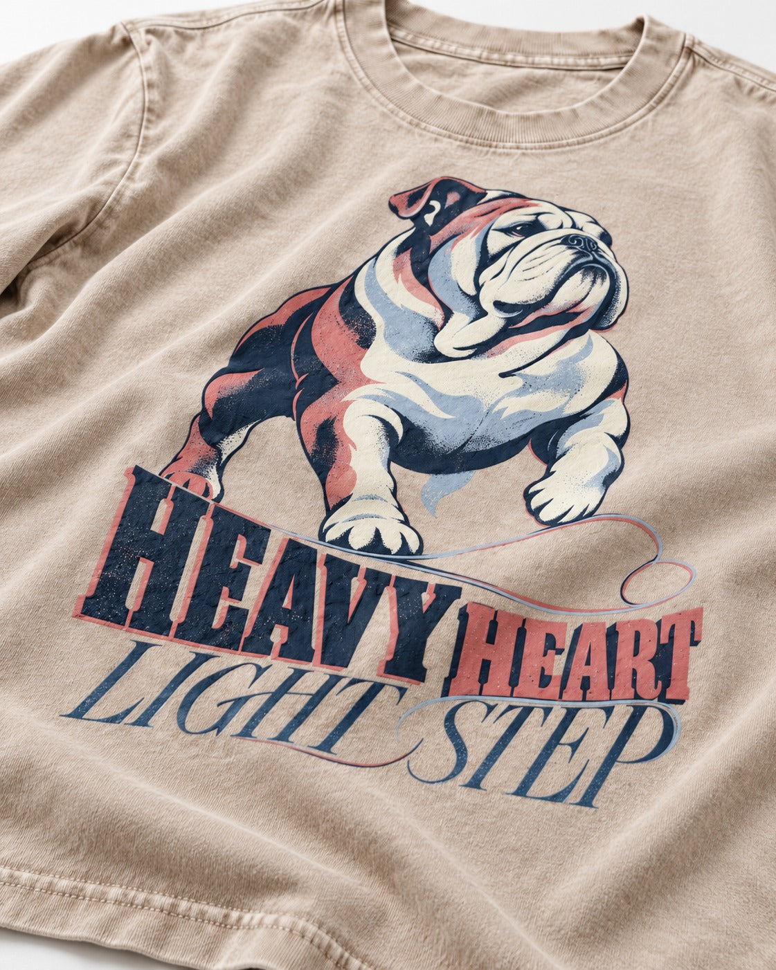 Heavy Heart Light Step English Bulldog Washed Tee in Apricot, close-up of the graphic