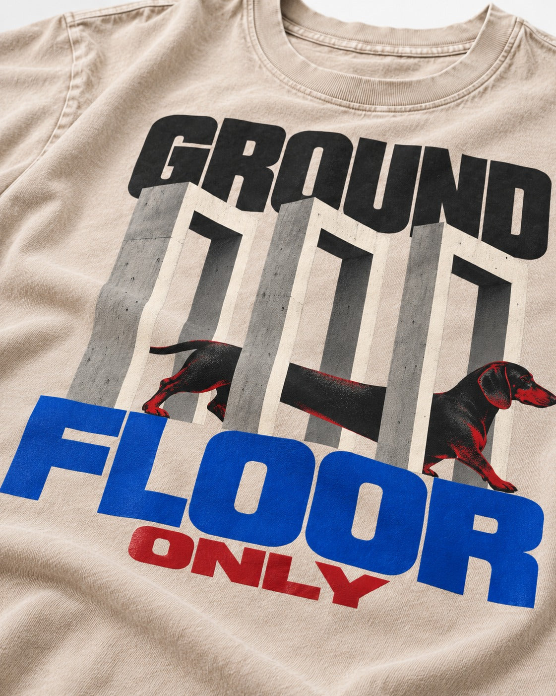 Ground Floor Only Dachshund Washed Tee in Apricot, close-up of the graphic