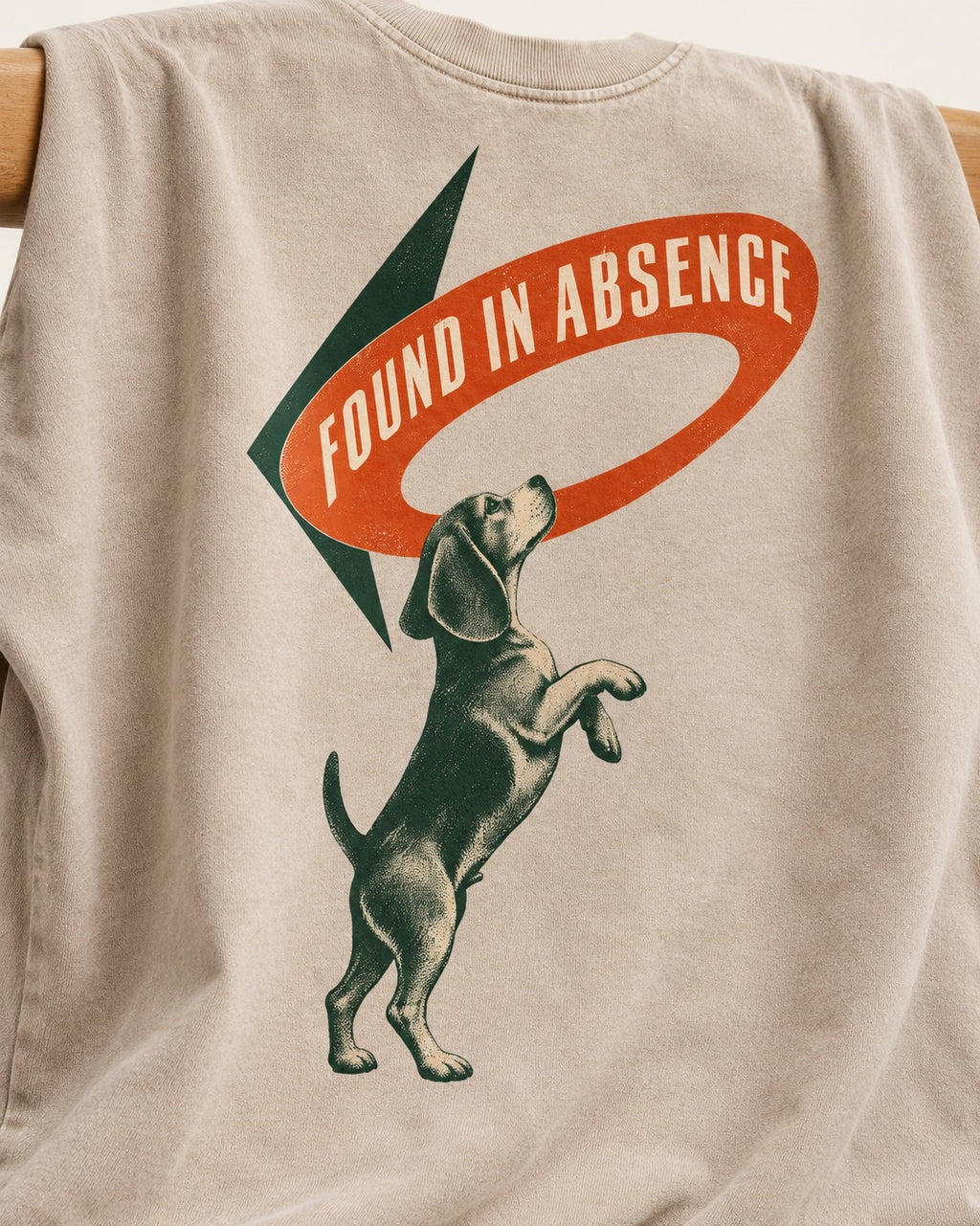 Beagle Found in Absence Washed Tee in Apricot, close-up of the graphic