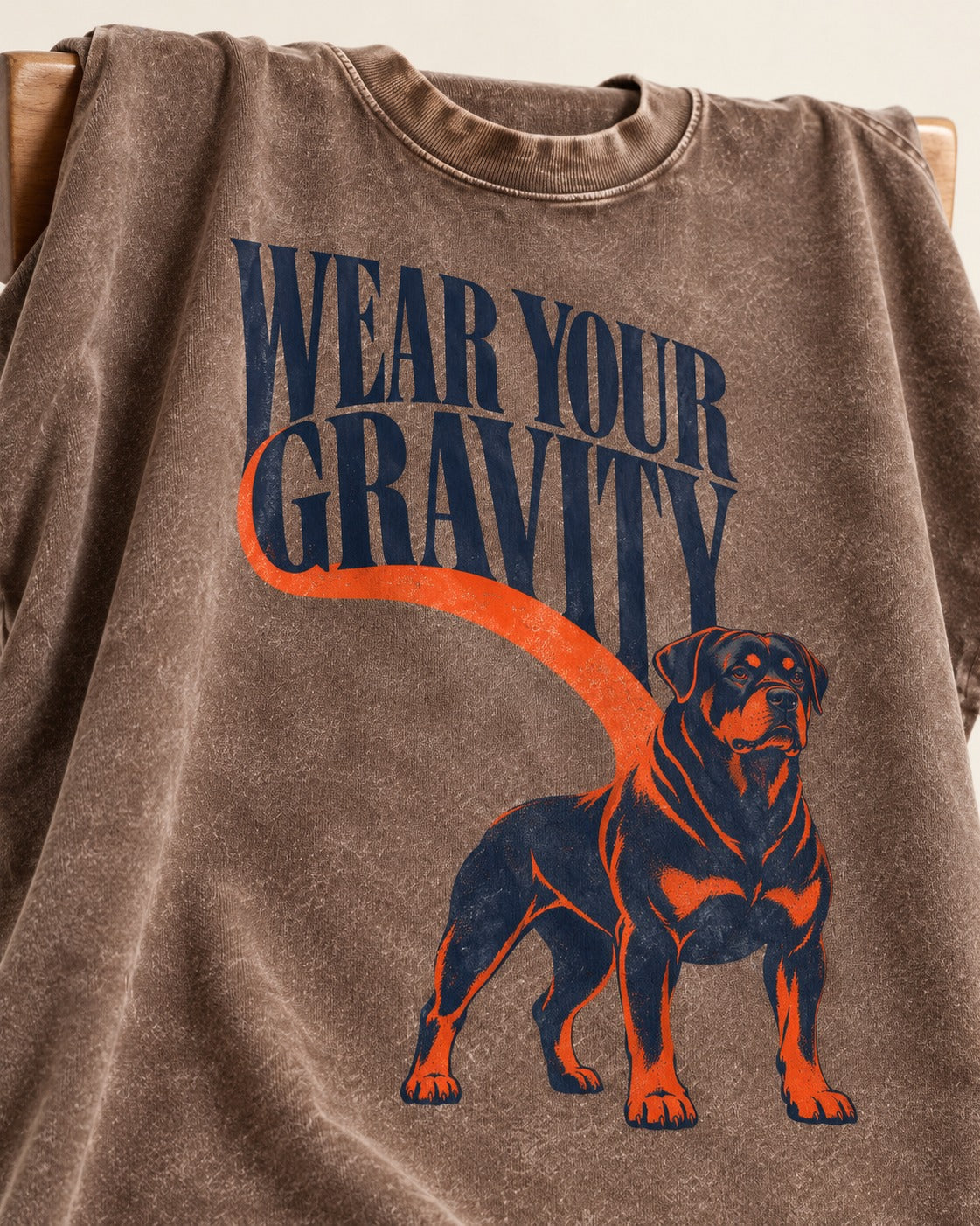 Wear Your Gravity Rottweiler Washed Tee in Coffee, close-up of the graphic