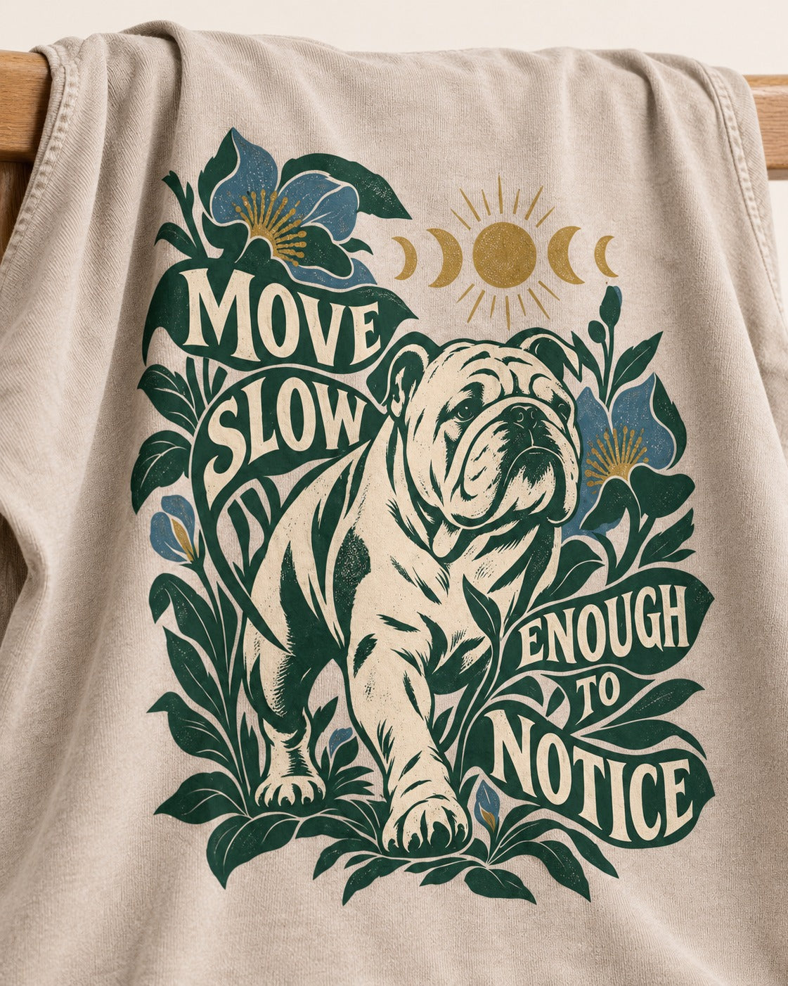 Move Slow English Bulldog Washed Tee in Apricot, close-up of the graphic