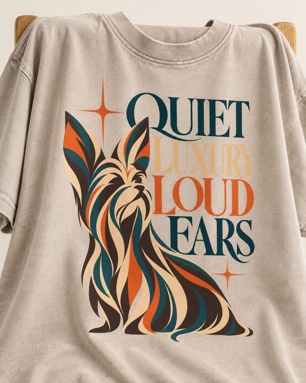 Quiet Luxury Loud Ears Yorkshire Terrier Washed Tee in Apricot, close-up of the graphic