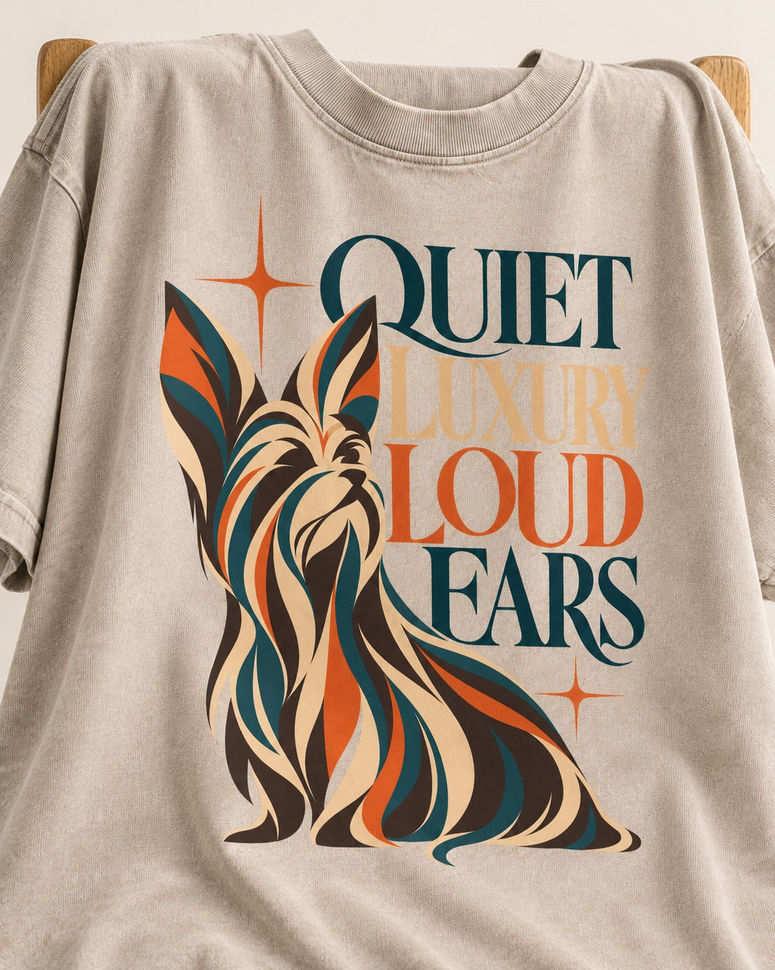 Quiet Luxury Loud Ears Yorkshire Terrier Washed Tee in Apricot, close-up of the graphic