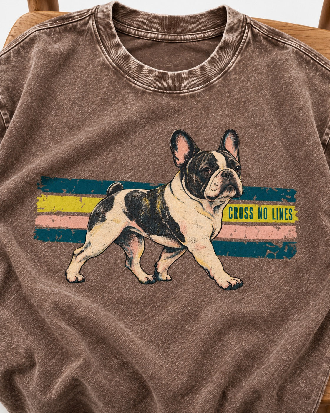Frenchie Cross No Lines Washed Tee in Coffee, close-up of the graphic