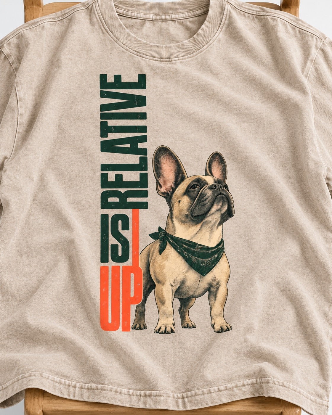 Up Is Relative Frenchie Washed Tee in Apricot, close-up of the graphic