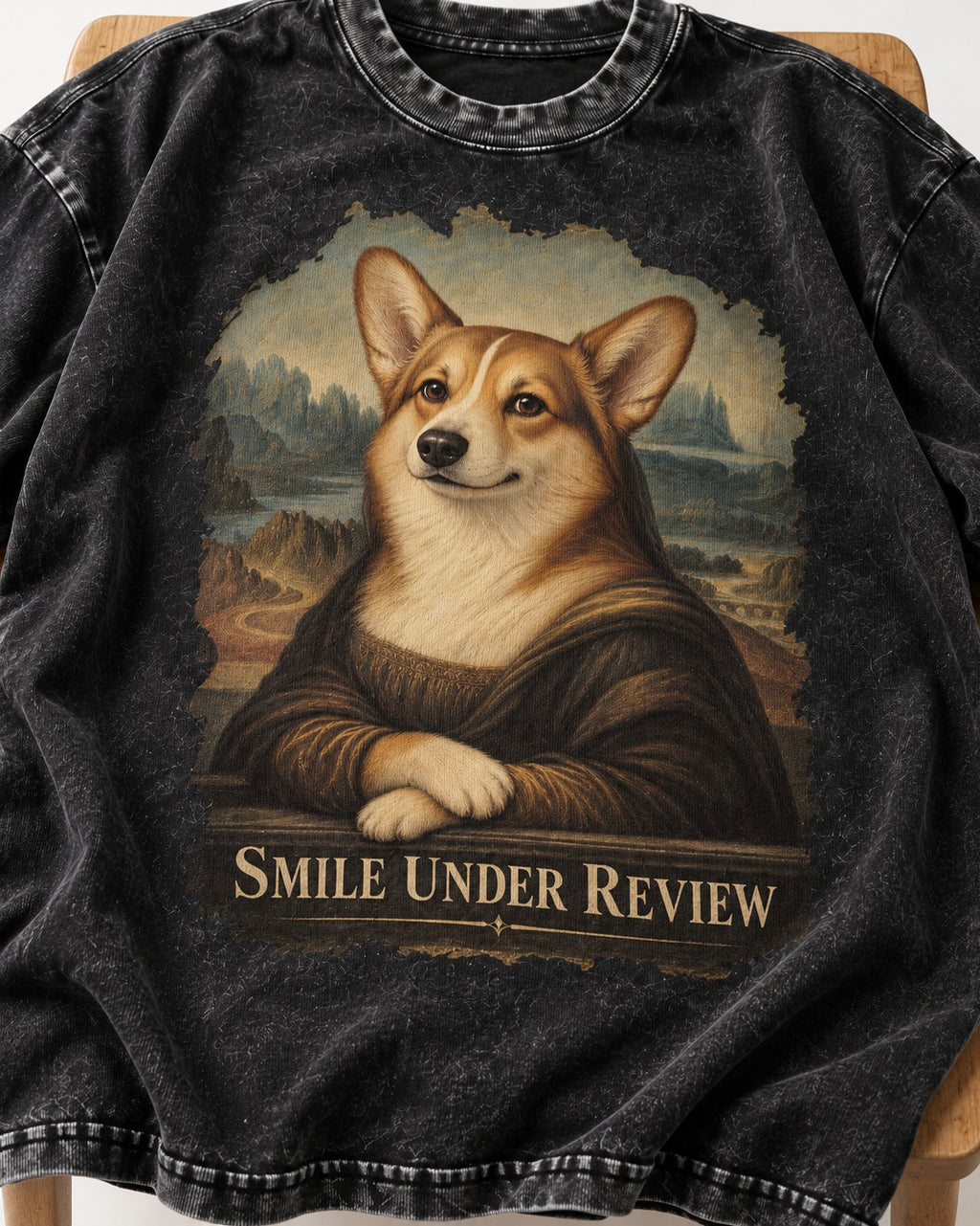 Corgi Smile Under Review Mona Lisa Portrait Washed Tee in Black, close-up of the graphic