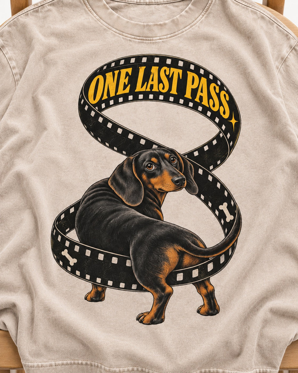 Dachshund's One Last Pass Washed Tee in Apricot, close-up of the graphic