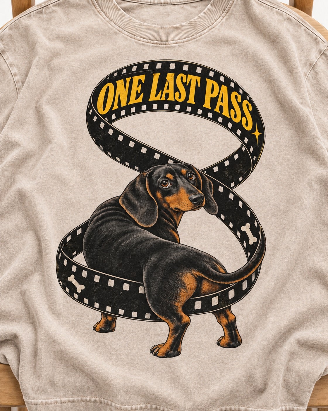 Dachshund's One Last Pass Washed Tee in Apricot, close-up of the graphic