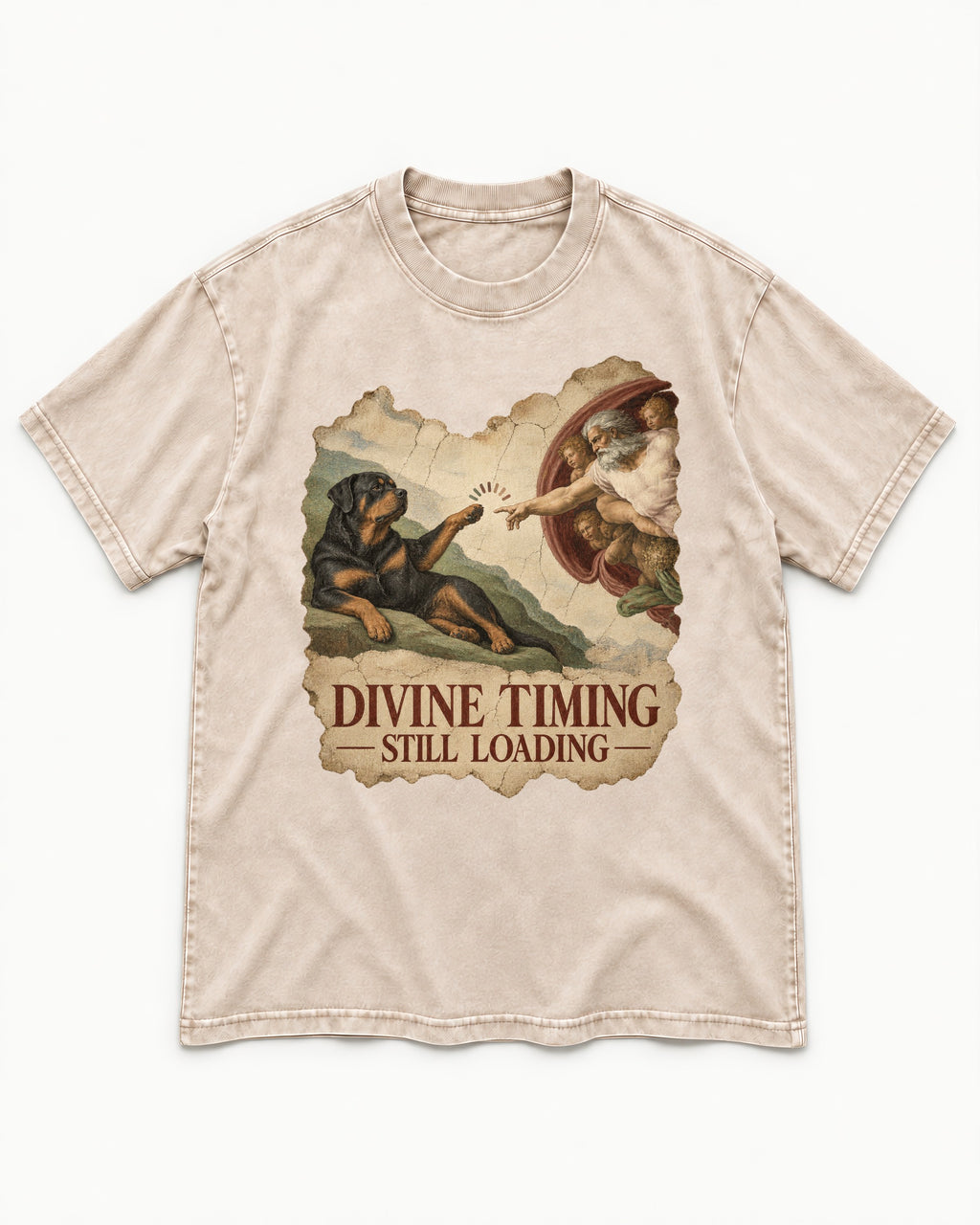 Rottweiler Divine Timing Still Loading Creation Parody Graphic Washed Tee in Apricot, flat lay product photo