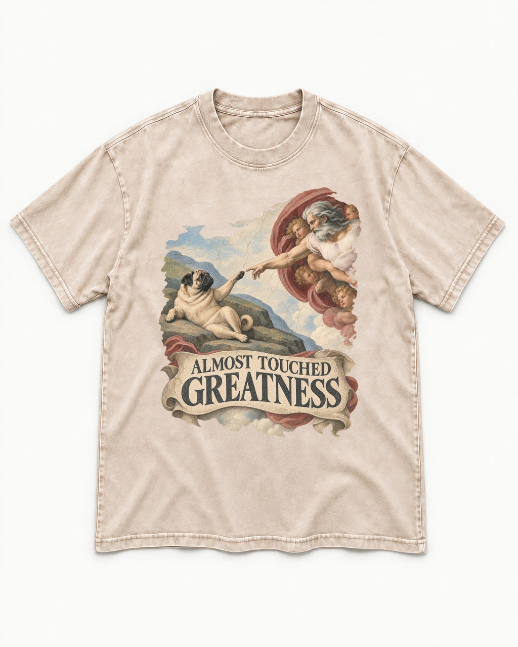 Pug Almost Touched Greatness Creation Parody Graphic Washed Tee in Apricot, flat lay product photo