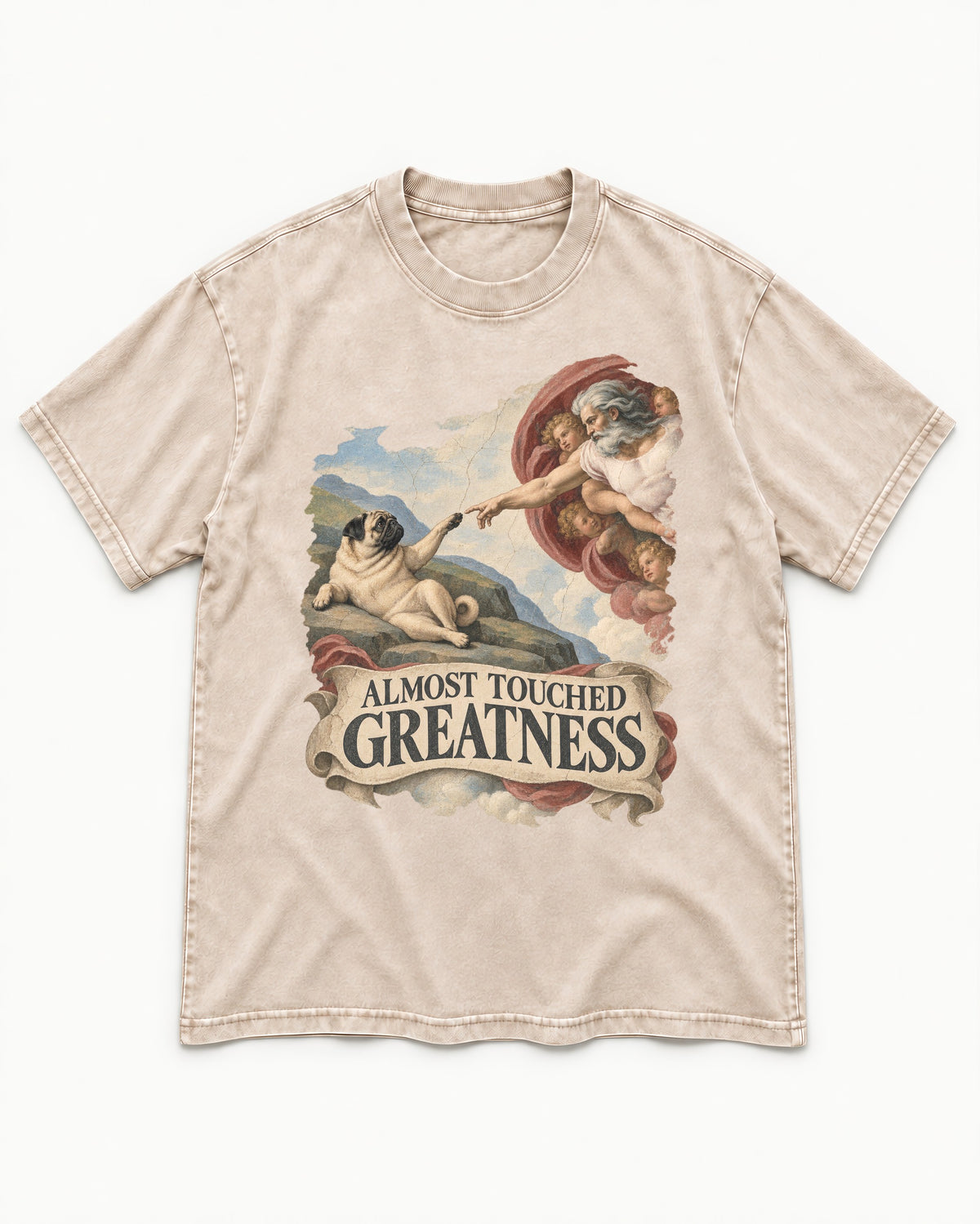 Pug Almost Touched Greatness Creation Parody Graphic Washed Tee in Apricot, flat lay product photo