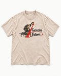 A Dachshund Correction Follows Washed Tee in Apricot, flat lay product photo