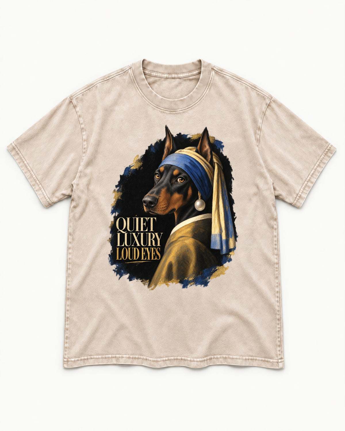 Doberman Quiet Luxury Loud Eyes Pearl Portrait Graphic Washed Tee in Apricot, flat lay product photo