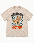 Water Off Joy on Golden Retriever Washed Tee in Apricot, flat lay product photo